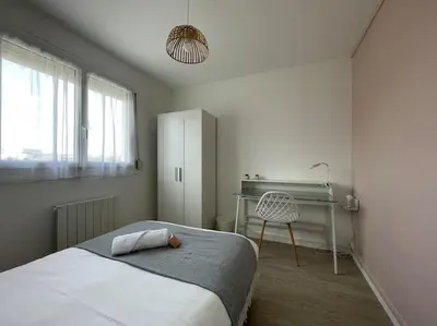 Un ou plusieurs lits dans un hébergement de l'établissement Rouen Saint Julien - L'Esprit village