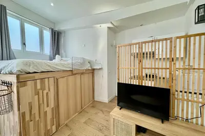 Un ou plusieurs lits dans un hébergement de l'établissement Sofia Studio confortable en RDC au coeur de la ville de Rouen