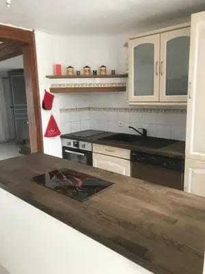 Cuisine ou kitchenette dans l'établissement la MAISON de SEVERINE