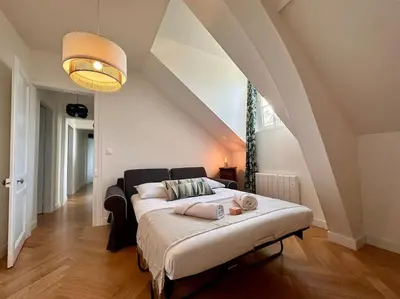 Un ou plusieurs lits dans un hébergement de l'établissement Rouen Paris - Domaine de l'Oison