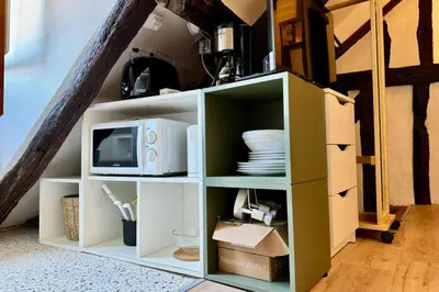 Télévision ou salle de divertissement dans l'établissement Vera Studio Confortable sous les combles !