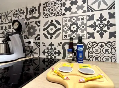 Cuisine ou kitchenette dans l'établissement Elfeuf centre - Chez Maxime