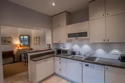 Cuisine ou kitchenette dans l'établissement La maison du 18