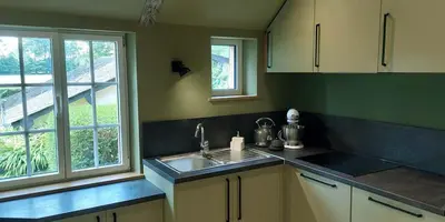 Cuisine ou kitchenette dans l'établissement Le Cottage -Gîte de charme-
