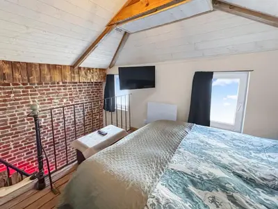 Un ou plusieurs lits dans un hébergement de l'établissement Duplex Calme & Cosy - 2 min Gares & Proche Aéroport