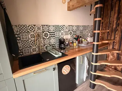 Cuisine ou kitchenette dans l'établissement Duplex Calme & Cosy - 2 min Gares & Proche Aéroport