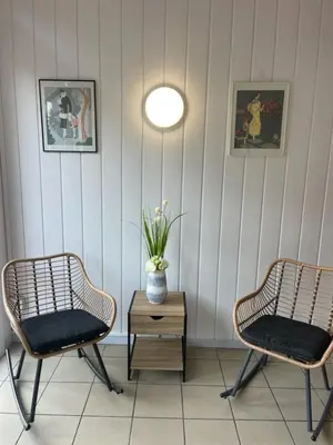 Coin salon dans l'établissement Parc Hôtel