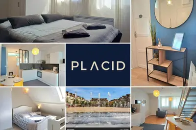 Un ou plusieurs lits dans un hébergement de l'établissement Le Loft - En Plein Centre Très Spacieux