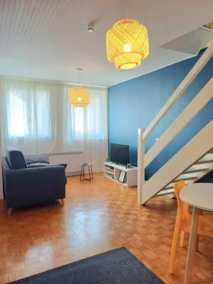 Coin salon dans l'établissement Le Loft - En Plein Centre Très Spacieux