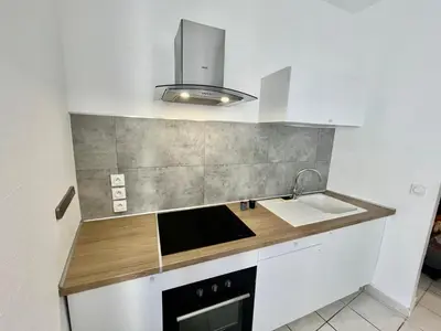 Cuisine ou kitchenette dans l'établissement Le Blue Bay