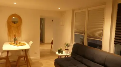 Coin salon dans l'établissement CosyRouen Jacuzzi Parking gratuit