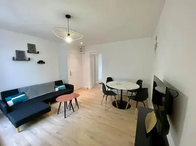Coin salon dans l'établissement Appartement rénover avec terrasse