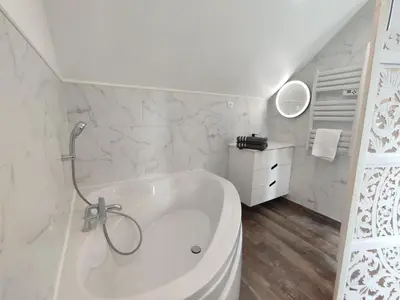 Salle de bains dans l'établissement Gite La Fleuv'Yeres