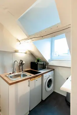 Cuisine ou kitchenette dans l'établissement Le Loft - studio en Hypercentre - Cathédrale