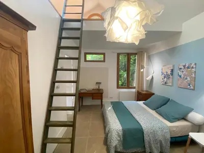 Un ou plusieurs lits dans un hébergement de l'établissement Maison Félice