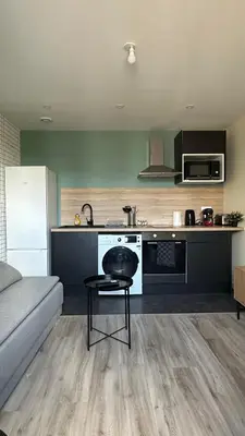 Cuisine ou kitchenette dans l'établissement Appartement Cosy Clinique Mathilde