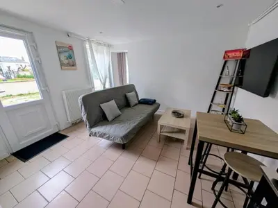 Télévision ou salle de divertissement dans l'établissement maison