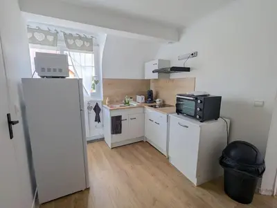 Cuisine ou kitchenette dans l'établissement maison