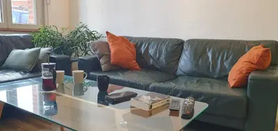 Coin salon dans l'établissement Maison Calme Terrasse et Jardin Vue Forêt