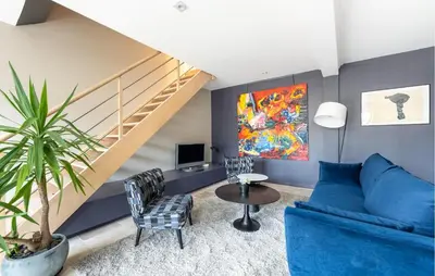 Coin salon dans l'établissement Amazing Home In Vienne-En-Arthies