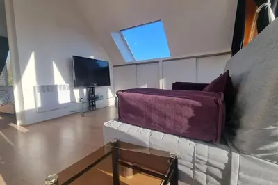 Télévision ou salle de divertissement dans l'établissement havre de paix
