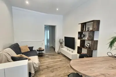 Télévision ou salle de divertissement dans l'établissement Bel appartement rdc détente Balnéo & Ciné & Terrasse proche Centre Gare Amiens