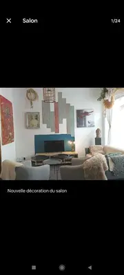 Coin salon dans l'établissement Appartement spacieux