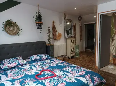Un ou plusieurs lits dans un hébergement de l'établissement Appartement spacieux