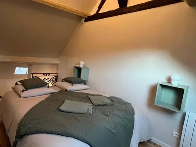 Un ou plusieurs lits dans un hébergement de l'établissement Maison de ville - idéal déplacements et familles - 35 min Paris - Versailles - Giverny