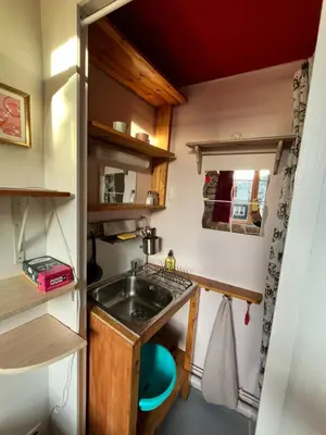 Cuisine ou kitchenette dans l'établissement Petit nid ensoleillé
