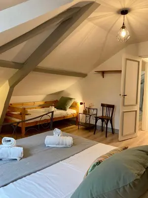 Un ou plusieurs lits dans un hébergement de l'établissement A 2 pas Maison 3 couchages