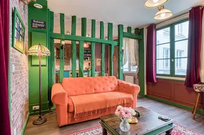 Coin salon dans l'établissement Appartement Friends