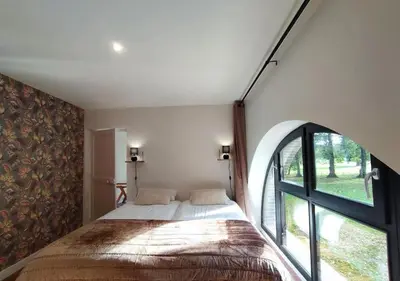 Un ou plusieurs lits dans un hébergement de l'établissement grande maison de campagne