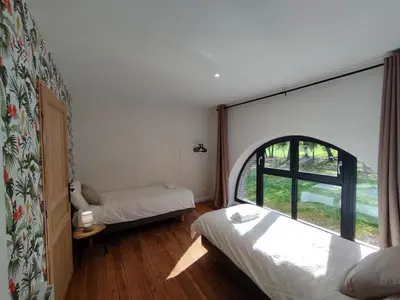 Un ou plusieurs lits dans un hébergement de l'établissement grande maison de campagne