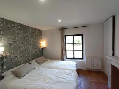 Un ou plusieurs lits dans un hébergement de l'établissement grande maison de campagne