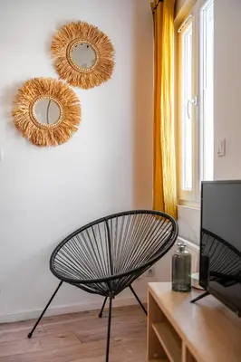 Télévision ou salle de divertissement dans l'établissement Charmante Maison à Rouen