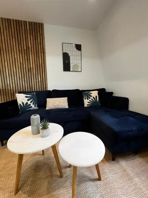 Coin salon dans l'établissement Appartement design et cozy à port cergy