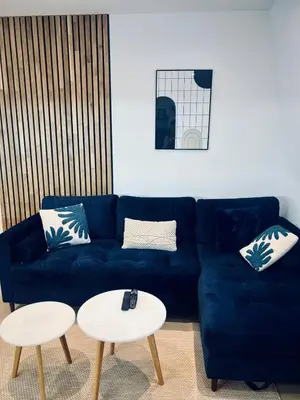 Coin salon dans l'établissement Appartement design et cozy à port cergy