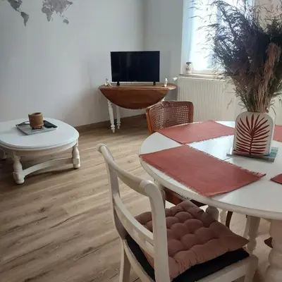 Télévision ou salle de divertissement dans l'établissement Terracotta