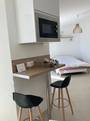 Télévision ou salle de divertissement dans l'établissement Studio style loft