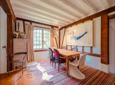 Coin salon dans l'établissement Maison au bord de la Seine