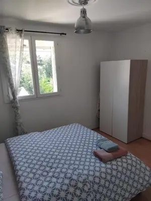 Un ou plusieurs lits dans un hébergement de l'établissement Joli appartement 2 pièces sur Liancourt