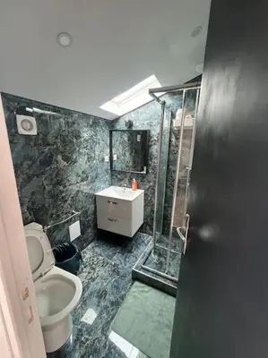 Salle de bains dans l'établissement Love room jacuzzi proche centre ville