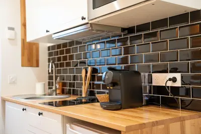Cuisine ou kitchenette dans l'établissement Maison Cosy Centre Gare Amiens