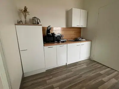 Cuisine ou kitchenette dans l'établissement Nova nuit