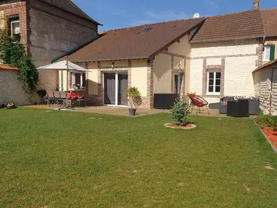 Jardin de l'établissement Maison de charme avec jardin au bord de l'Eure