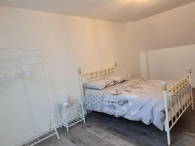 Un ou plusieurs lits dans un hébergement de l'établissement Gîte la Belle des Champs