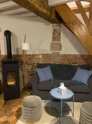 Coin salon dans l'établissement Le Colombier d Yville