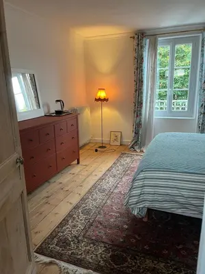 Un ou plusieurs lits dans un hébergement de l'établissement chambre aux oiseaux