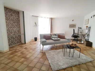 Coin salon dans l'établissement Le Nid Douillet - Gare 5 min , accès Paris facile